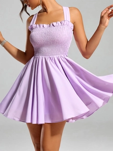 Detail of lavender purple A-line mini dress with shirred bodice and ruffled trim edges