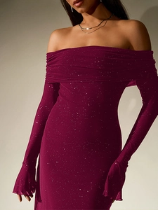 Detail of burgundy off-shoulder mesh dress with shimmering glitter and pleated bust design