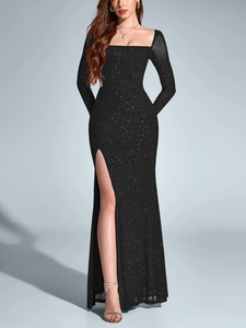 Detail of black glitter mesh maxi dress with square neckline and high side slit