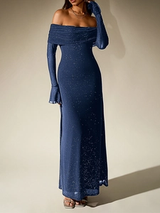 Close-up detail of the dark blue off-shoulder mesh dress with shimmering silver sequins