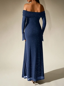 Detail of glittery mesh fabric and off-shoulder back design on navy blue evening dress