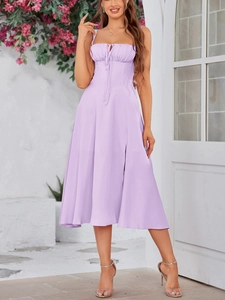 Detail of light purple midi dress featuring ruched drawstring chest and side leg slit