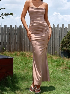 Detail of mocha brown backless dress featuring cowl neck and side ruched bodycon design