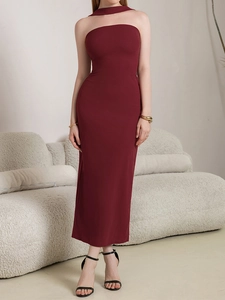 Detailed view of burgundy halter neck maxi dress with slim fit and elegant backless design