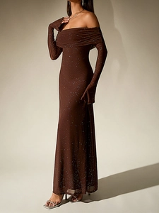 Detailed view of the dark brown off-shoulder evening dress with glitter mesh and long sleeves