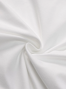 Macro shot of high-quality white knitted fabric texture showing soft pleats and draping