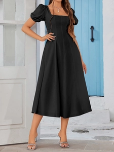 Detail of square neckline and puff sleeves on this black A-line midi dress for women
