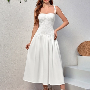 Elegant white lace strap maxi dress with smocked bodice and adjustable tie shoulders