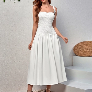 Elegant white smocked midi dress with lace stitching and tie-up shoulder straps