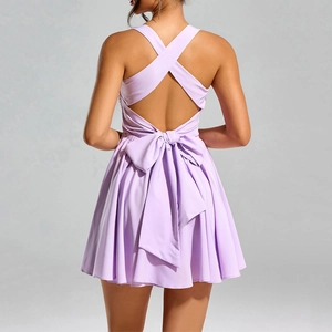 Lavender backless mini dress with cross straps and large bow detail in A-line silhouette