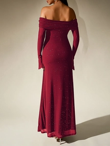 Detail of burgundy mesh dress showing off-the-shoulder back and shimmering silver sequins