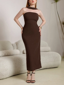 Detail of coffee brown halter tube dress with elegant neck strap and slim fit fabric