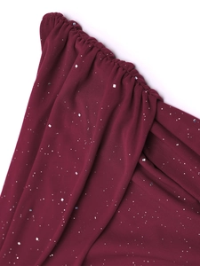 Detail of wine red mesh fabric with silver glitter and elastic ruched design texture