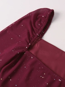 Macro detail of burgundy mesh fabric with silver sequins and fine stitching craft