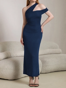 Close-up of elegant navy one-shoulder dress with waist pleats and side cutout detail