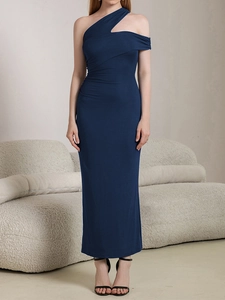 Detailed view of dark blue one-shoulder dress with hollow neckline and side ruffles