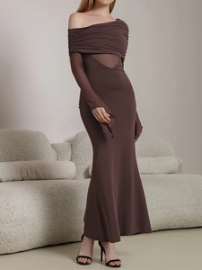 Detail of dark brown bodycon dress with sheer mesh waist panel and flared sleeve cuffs
