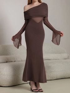 Detail of coffee brown dress with off-shoulder neckline and mesh paneling texture