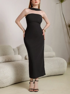 Detail of elegant black strapless maxi dress with unique neck strap and slim fit silhouette