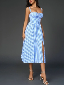 Detail view of blue gingham midi dress with ruched chest drawstring and high side slit