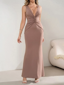 Detail of the elegant ruched waist and deep V-neckline on this mocha maxi fishtail dress