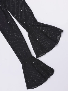 Detailed view of black mesh sleeve featuring silver sequins and a flared bell cuff design