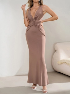 Detail of elegant mocha brown mermaid dress with deep V-neck and ruched waistline
