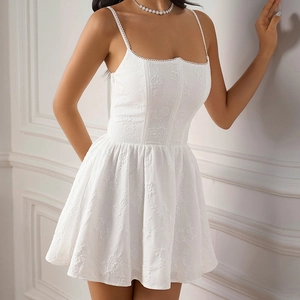 White fishtone corset dress with floral jacquard texture and elegant A-line silhouette
