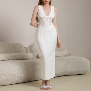 Elegant white sleeveless maxi dress with deep V-neck and hollow lace patchwork details