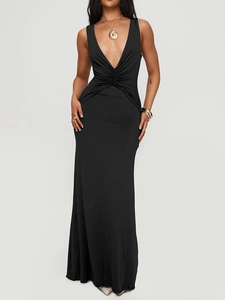 Detail of elegant black deep V-neck maxi dress with stylish pleated waist design