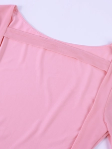 Detailed view of the pink mesh flared sleeve dress with back bow tie design