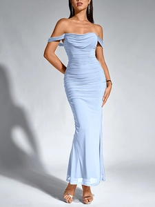 Detailed view of the light blue ruched mesh fabric on a long off-shoulder fishbone dress