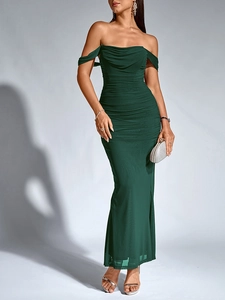 Detail of a dark green off-shoulder pleated mesh maxi dress with ruching effects