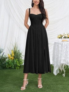 Detail of black corset midi dress featuring a side slit and elegant lace-up back design