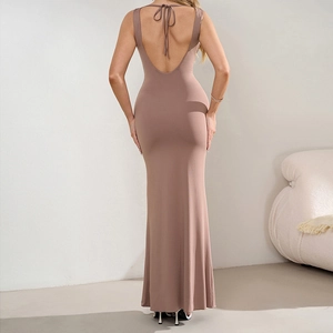 Elegant backless taupe maxi dress with halter neck and slim fishtail silhouette