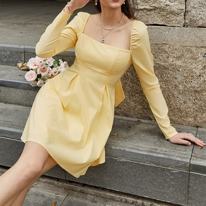 Elegant light yellow square neck long sleeve mini dress with ruched waist and open back