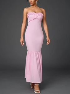 Close-up of pink strapless mermaid dress with elegant double-layered ruffle detail