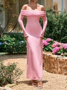 Detail of the pink mesh long sleeve dress showing ruffled cuffs and off-shoulder cut