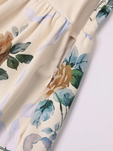 Detail of invisible zipper on floral print backless maxi dress with vintage flowers