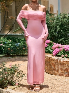 Close-up of pink mesh off-shoulder dress featuring ruffled neckline and sleeve details