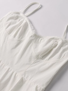 Detail shot of the white lace trim and pleated bodice on this sexy A-line mini dress