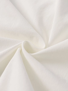 Macro detail of white Tencel slub fabric texture with elegant vertical stripes