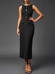 Close-up of ribbed knit fabric detail and metallic buttons on black sleeveless dress