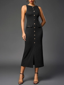 Detail of black ribbed knit dress featuring decorative gold buttons and front high slit