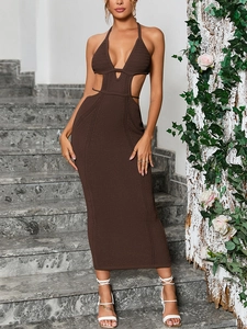 Detail of dark brown crochet knit dress with halter V-neck and waist cut-outs