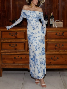 Detail of elegant off-shoulder long sleeve dress with blue rose floral pattern print