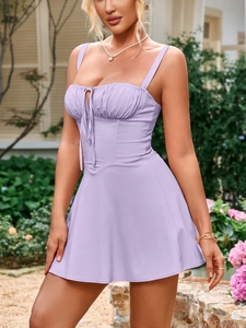 Detail of lavender fishbone dress featuring ruched chest and bow-tie lace-up design