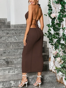 Detail view of brown crochet maxi dress featuring a halter neck and lace-up back design