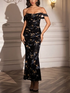 Detail of off-shoulder floral maxi dress with fishbone mesh and elegant backless design
