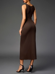 Detail view of the ribbed knit texture and slim fit design of a brown sleeveless maxi dress